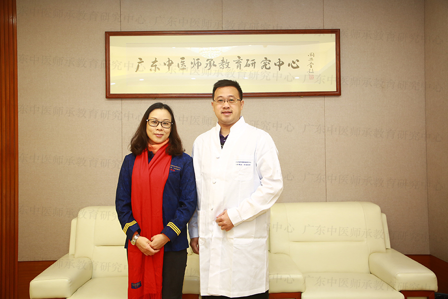 师承学员余志东与导师粟漩的合影.jpg